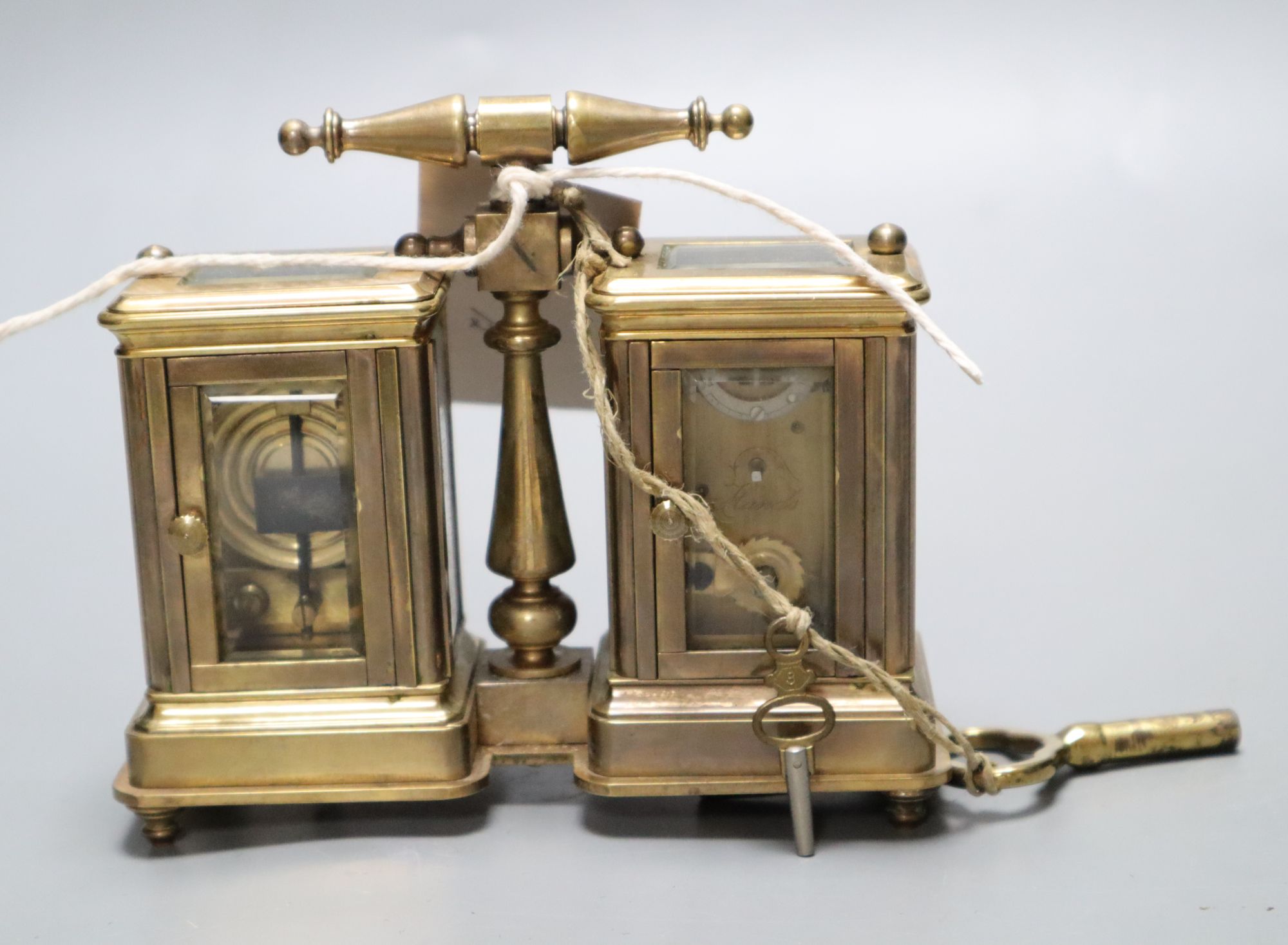 A brass miniature carriage clock/ barometer